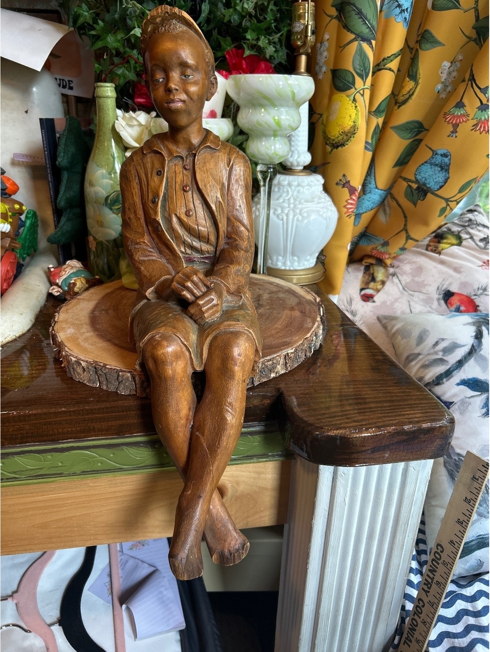 Young boy wood carved